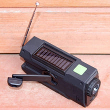 Load image into Gallery viewer, Ready Hour 4-in-1 Emergency Solar Flashlight &amp; AM/FM/Weather Radio w/ Hand Crank
